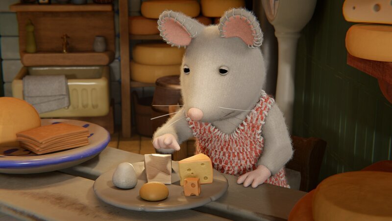 Julia hat den Verkauf im Käseladen von Tonios Eltern übernommen. – Bild: ZDF/​Cielo Films/​Caribara Production/​SuperswissRed/​M.A.R.K.13/​ZDF Studios GmbH