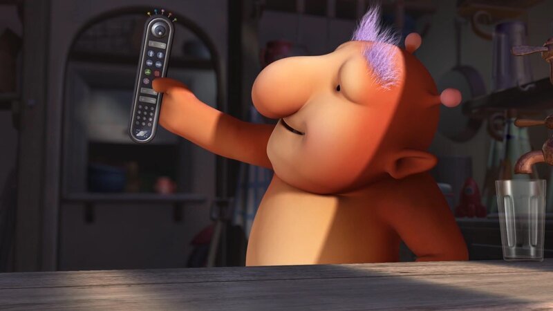 Groobie freut sich über seine neue Fernbedienung. – Bild: KiKA/​Snapper Productions/​Q Pootle 5 LTD