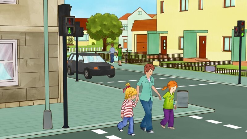 Conni (l.) und Anna (r.) freuen sich, endlich zeigt die Ampel grün, und sie können weiter. – Bild: ZDF/​(c) Henning Windelband (Youngfilms GmbH)