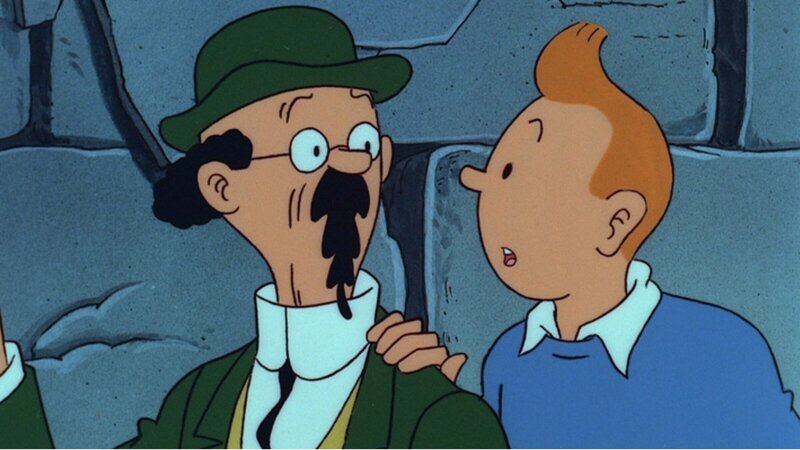 Tim (r.) und seine Begleiter Professor Bienlein (l.) werden auf einer Insel entführt, können jedoch entkommen. Tim folgt einer geheimnisvollen Stimme in unterirdische Gänge, während die anderen skeptisch sind. Als der Vulkan ausbricht, erhalten sie unerwartete Hilfe von einem neuen Verbündeten. – Bild: Ellipsanime/​France 3/​M6/​Nelvana; Hergé – Moulinsar