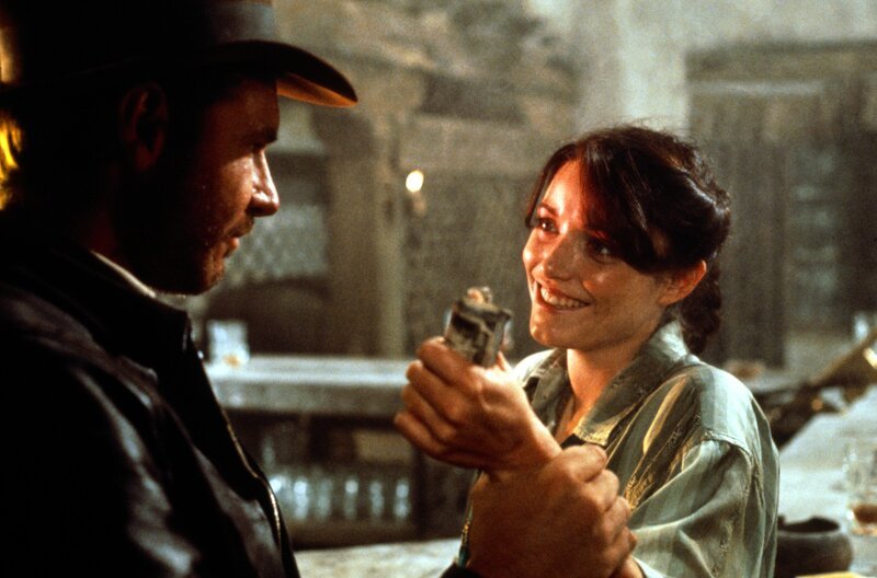 Ein unschlagbares Team: Indiana Jones (Harrison Ford, l.) und Marion (Karen Allen, r.) … – Bild: TM & © 2002 by Paramount Pictures. All Rights Reserved. Lizenzbild frei