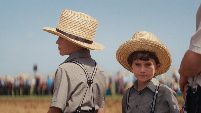 Zwei amische Jungen an den «Horse Progress Days», dem grössten amischen Landwirtschaftsfestival – Bild: SRF/​La Souris Verte