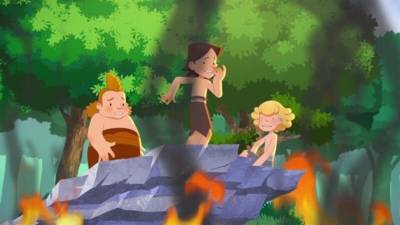 Der Feuerstein entzündet das trockene Gras und plötzlich sind Lad und seine Freunde Nic und Nob vom Feuer eingeschlossen. – Bild: Kinderkanal