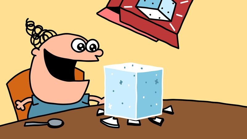 Trafalgar schaut begeistert auf einen Zuckerblock, der auf dem Tisch vor ihm liegt. – Bild: NDR/​DR & Nice Ninja