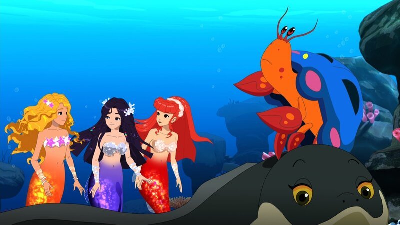Emma, Cleo und Rikki (v.l.n.r.) haben sich in Meerjungfrauen verwandelt. Auf ihrer Unterwassertour lernen sie Bernie, den Einsiedlerkrebs kennen. – Bild: ZDF und Les Cartooneurs Associés