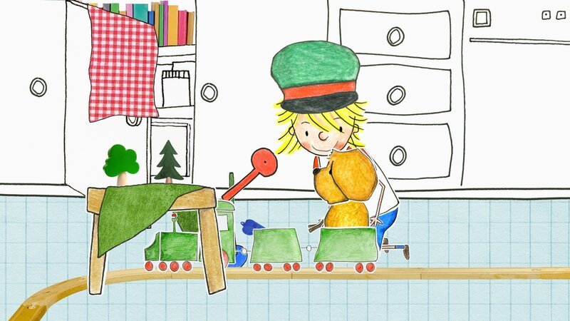 Paula und Ferdinand spielen mit der Eisenbahn. – Bild: rbb