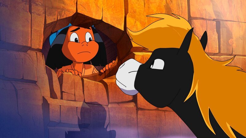 Yakari hat in einer Höhle Unterschlupf vor den Raben gefunden und bittet sein Pony Kleiner Donner um Hilfe. – Bild: WDR/​Ellipsanime Productions/​Belvision/​Les Cartooneurs Associés/​2 Minute