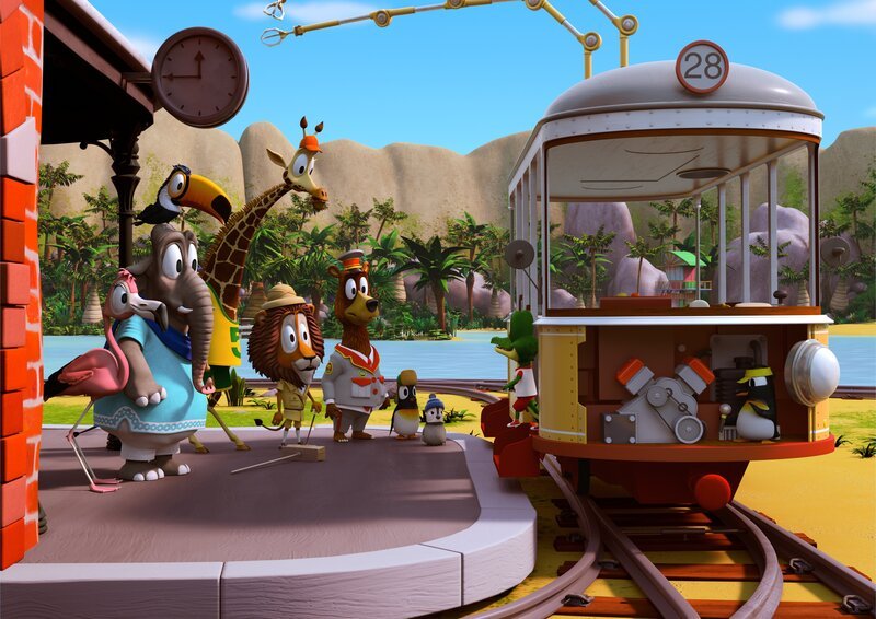 Anni, das Pinguin-Mädchen, hat sich im Motorraum der Bahn versteckt und spielt den Freunden mit dem Stimmenverwandler, den Zacki neu erfunden hat, einen Streich. Die Tiere auf dem Bahnsteig wundern sich, wer über Lautsprecher zu ihnen spricht. – Bild: ZDF/​Grid Animation, TELEGAEL