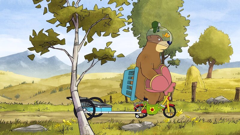 Dr. Brumm radelt zum See, um dort alle Dinge wieder loszuwerden, die an ihm dranhängen. – Bild: rbb/​WunderWerk/​TRIKK 17