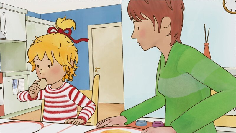 Für den Osterstrauch will Conni Eier bemalen. Die Eier dazu auspusten ist ganz schön anstrengend. – Bild: ZDF/​Henning Windelband/​Youngfilms GmbH