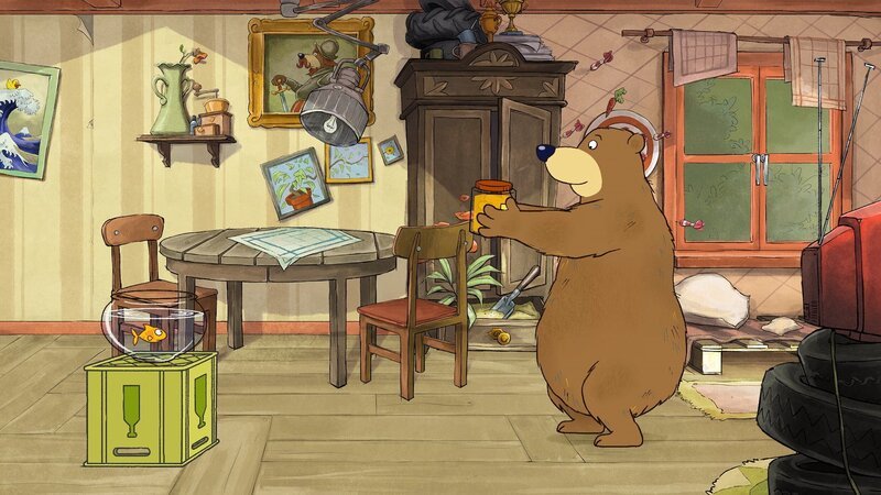 Dr. Brumm schnappt sich sein Honigglas für weitere Sportübungen: mit ein paar Kniebeugen fängt er an. – Bild: rbb/​WunderWerk/​TRIKK 17