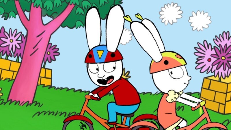 Im Park haben Simon (l.) und seine Freundin Lou (r.) großen Spaß beim gemeinsamen Fahrradfahren. – Bild: GO-N Productions