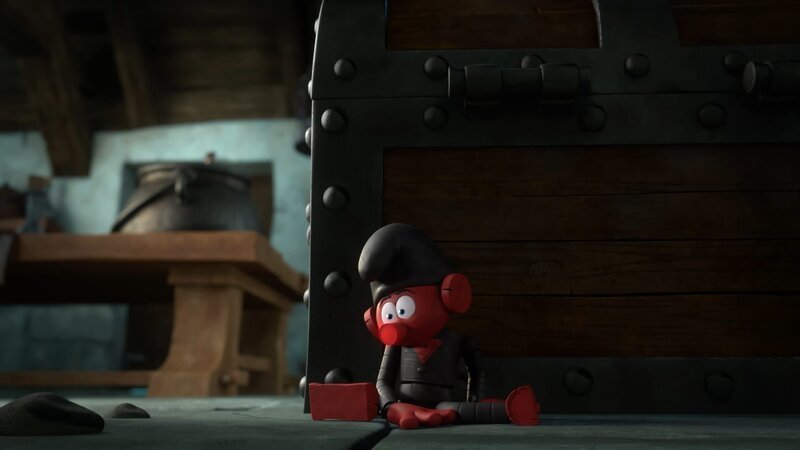 Um vor Gargamel sicher zu sein tut Windel-Wickler so, als sei er ein Spielzeug. – Bild: KiKA/​Peyo Productions, Dupuis Édition & Audiovisuell