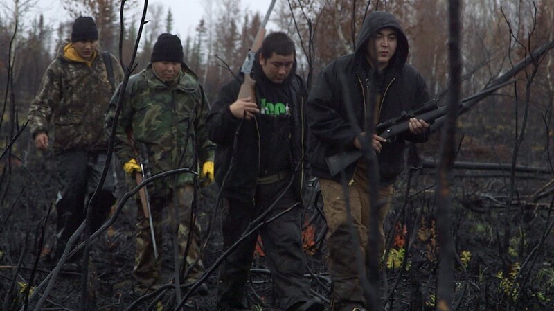 Tyson Len Kriska, H.A. Peters, Joey Zuray, and Patrick Erhart head back to their boat after killing a moose. They need to grab the right materials to properly quarter the moose. – Bild: Discovery Communications