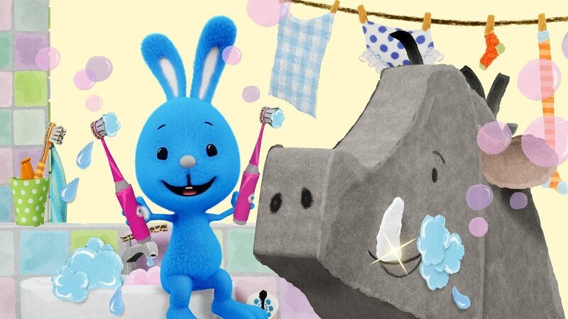 Bei den großen Hauern des Wildschweins braucht Kikaninchen gleich doppelte Zahnputzkraft. – Bild: KiKA/​Studio.TV.Film GmbH