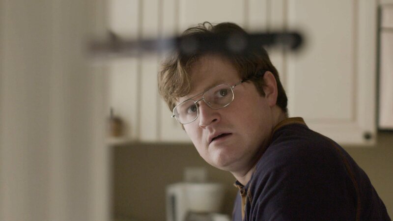 Shot of Vernon (Alvin Christmas) looking at knife stuck on the wall. – Bild: Discovery Communications, LLC
