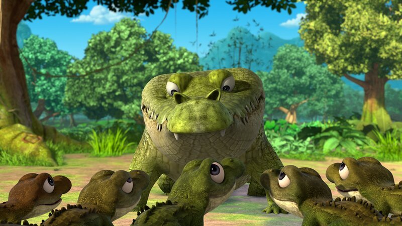 Jakala, der alleinerziehende Krokodilvater, erzählt seinen Söhnen die Legende des Regenbogen-Krokodils. – Bild: DQ Entertainment (Ireland) Limited