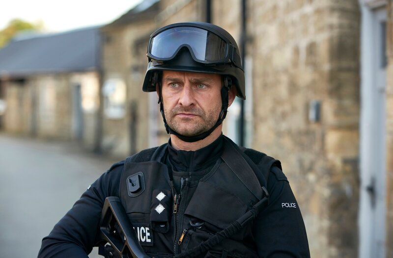 Robbo (MARK STOBBART) – Bild: WDR/​2022 World Productions Limited/​ITV