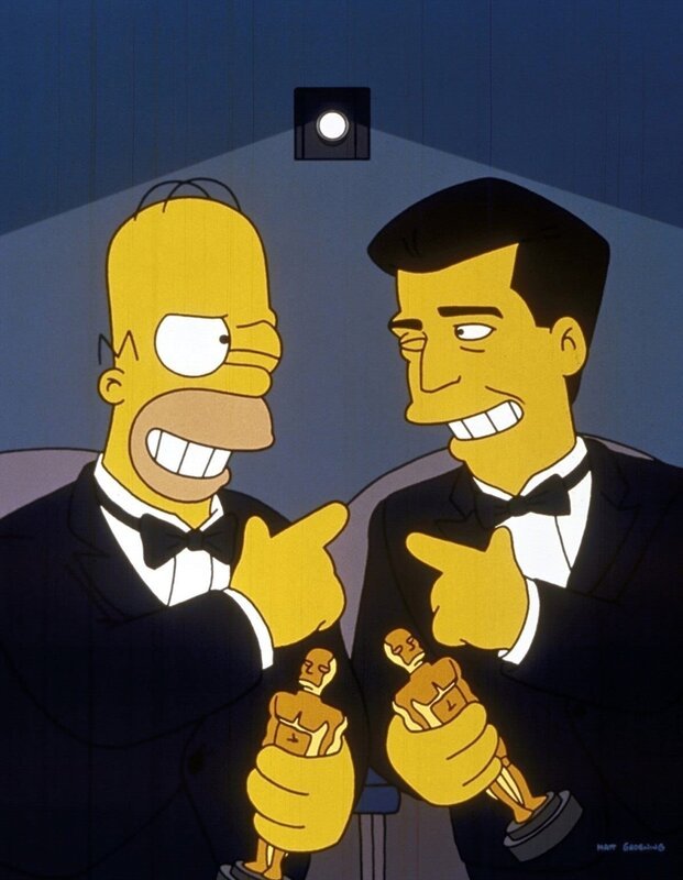 Homer (l.) und Mel Gibson (r.) besuchen gemeinsam „ihre“ Filmpremiere. – Bild: ProSieben MAXX