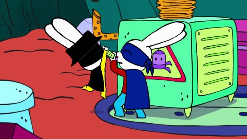 Mit vereinten Kräften versuchen Captain Hase (l.) und Superhase (r.), Professor Wolfs Robo-Läuse-Maschine abzuschalten. Doch der Hebel klemmt. – Bild: ZDF