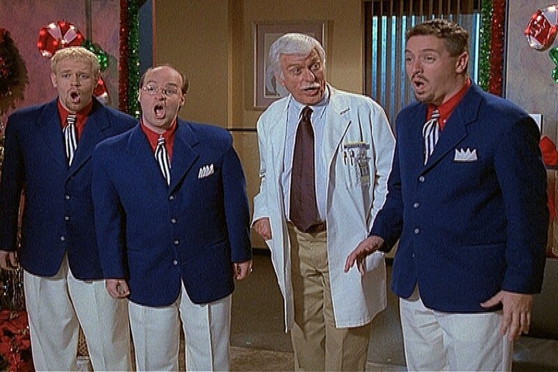 Mark (Dick Van Dyke, 2.v.r.) hat zur Weihnachtsfeier im Krankenhaus eine Gruppe Sänger eingeladen und überrascht seine Patienten mit einem Ständchen. – Bild: Viacom Lizenzbild frei