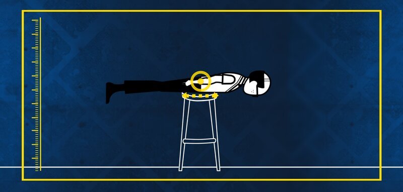 Science character ‚planking‘ a stool. When planking, your base is wherever your body makes contact with the object you are planking on. (credit: National Geographic Channels/​IWC Media) – Bild: The National Geographic Channel