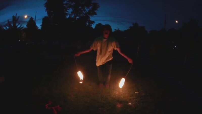 A fire dancer attempts a backflip and fails. – Bild: National Geographic