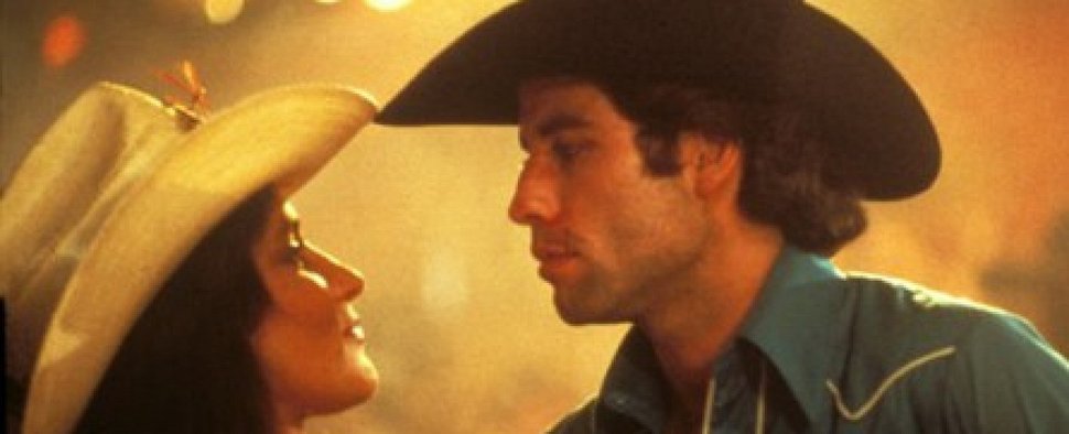 „Urban Cowboy“: Debra Winger und John Travolta als Sissy und Bud im Kinofilm – Bild: Paramount Pictures
