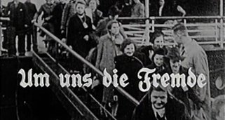 Um uns die Fremde